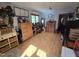 Room with wooden floors, blue walls, lots of windows, and an array of wooden furniture at 915 Phils Creek Rd, Chapel Hill, NC 27516