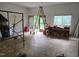 Spacious unfinished room with plywood floor and scaffolding at 915 Phils Creek Rd, Chapel Hill, NC 27516