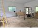 Interior view of unfinished room showing plywood flooring and ladder at 915 Phils Creek Rd, Chapel Hill, NC 27516