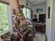 Bright studio space with natural light, a large window, and an array of art supplies at 915 Phils Creek Rd, Chapel Hill, NC 27516