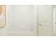 Bright and clean bathroom with a bathtub and shower, showcasing minimalist design at 00 Hanover Dr, Sanford, NC 27330