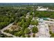 Expansive aerial view of 102 Rosebrooks Dr Cary amid lush greenery, showcasing its serene neighborhood location at 102 Rosebrooks Dr, Cary, NC 27513