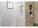 Efficient laundry room with built-in shelving and modern appliances for convenient chore management at 102 Rosebrooks Dr, Cary, NC 27513