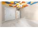 Carpeted bedroom with a geometric mural ceiling and closet space at 104 Crossway Ln, Holly Springs, NC 27540