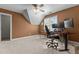 Bedroom with angled ceiling, workspace, and a window that provides natural lighting at 104 Crossway Ln, Holly Springs, NC 27540