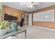 Bright office space with neutral carpet, a large desk, and a whiteboard wall for creative collaboration at 104 Crossway Ln, Holly Springs, NC 27540