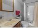 Modest bathroom with shower, sink with vanity, and toilet at 104 Pontiac Cv, Louisburg, NC 27549