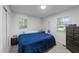 Bright bedroom with carpet flooring, with a white walls and closet at 104 Pontiac Cv, Louisburg, NC 27549