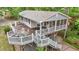 Lovely elevated deck with dining table and chairs plus outdoor seating at 104 Pontiac Cv, Louisburg, NC 27549