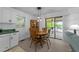 Charming dining area with a view of the lake at 104 Pontiac Cv, Louisburg, NC 27549
