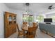 Cozy dining area adjacent to the living room with natural light at 104 Pontiac Cv, Louisburg, NC 27549