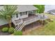 Lovely deck with dining table and chairs plus outdoor seating at 104 Pontiac Cv, Louisburg, NC 27549
