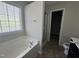 Bathroom featuring a soaking tub, shower, and modern fixtures at 105 Blue Bay Ln, Cameron, NC 28326