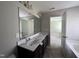 Bathroom featuring a double vanity, large mirror, and ample storage at 105 Blue Bay Ln, Cameron, NC 28326