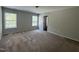 Spacious bedroom with neutral paint, carpet flooring, and ample natural light at 105 Blue Bay Ln, Cameron, NC 28326