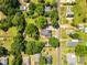 Aerial view of neighborhood featuring many homes and tree lined streets at 105 N 11Th St, Erwin, NC 28339