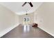 Spacious living room featuring hardwood floors, natural light, neutral paint, and ceiling fan at 105 N 11Th St, Erwin, NC 28339