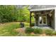 Relaxing back porch with a grill, perfect for outdoor dining and entertaining at 110 Pebble Creek Dr, Franklinton, NC 27525