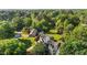 Desirable neighborhood with lush green lawns and mature trees around well-maintained homes at 1114 Balmoral Dr, Cary, NC 27511