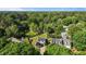 Scenic aerial view of homes with expansive lawn and mature trees offering privacy at 1114 Balmoral Dr, Cary, NC 27511
