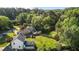Beautiful houses with backyard space surrounded by lush greenery and mature trees at 1114 Balmoral Dr, Cary, NC 27511
