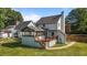 Home features a screened in porch and wooden deck, perfect for outdoor entertaining at 1114 Balmoral Dr, Cary, NC 27511