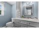 Bathroom features updated vanity, cabinetry, sink, and mirror at 1114 Balmoral Dr, Cary, NC 27511