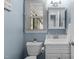 Cozy bathroom showcasing vanity, sink, and window at 1114 Balmoral Dr, Cary, NC 27511