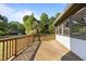 Large wooden deck with railings overlooking the backyard and featuring outdoor space at 1114 Balmoral Dr, Cary, NC 27511