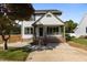 Charming two-story home with a welcoming front porch and well-maintained landscaping at 1114 Balmoral Dr, Cary, NC 27511
