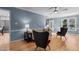 Open-concept living room features hardwood floors and stylish furniture, and bright light at 1114 Balmoral Dr, Cary, NC 27511