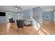 Inviting living room with ceiling fan, hardwood floors, and stylish neutral furnishings at 1114 Balmoral Dr, Cary, NC 27511