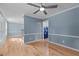 Spacious living room with access to laundry and dining room at 1114 Balmoral Dr, Cary, NC 27511