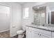 Bathroom featuring granite vanity, toilet, shower with glass doors, and tile flooring at 11412 International Dr, Middlesex, NC 27557