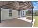 Home backyard with patio, string lights, and fire pit at 120 Cobblebrook Ct, Holly Springs, NC 27540