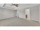 Bedroom featuring three doors and carpet at 120 Cobblebrook Ct, Holly Springs, NC 27540
