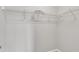 Walk-in closet with white wire shelving at 120 Cobblebrook Ct, Holly Springs, NC 27540