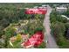 Aerial view shows property location with respect to Quail Corners Shopping Center and nearby roadways at 1213 Indian Trail Dr, Raleigh, NC 27609