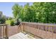 Back deck overlooking the backyard with trees and landscaping at , Chapel Hill, NC 27516