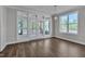 The dining area features a large window and sliding glass doors that lead to the back deck at , Chapel Hill, NC 27516