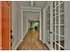 Bright entryway features wood floors, stylish light fixture, and view through french doors and to the open living area at , Chapel Hill, NC 27516