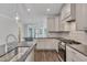 This modern kitchen features granite countertops, stainless steel appliances, and plenty of cabinet space at , Chapel Hill, NC 27516