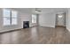 Bright living room featuring wood floors, a modern fireplace, and plenty of natural light from large windows at , Chapel Hill, NC 27516