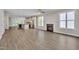 Open-concept living area seamlessly connects to the kitchen, featuring hardwood floors and a cozy fireplace at , Chapel Hill, NC 27516