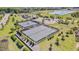 Aerial view of tennis and basketball courts with lake in the distance at , Chapel Hill, NC 27516