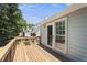 Wooden back deck with a view of the yard at 140 Heatherwood Dr, Apex, NC 27502