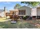View of the backyard featuring a deck and a screened-in porch at 140 Heatherwood Dr, Apex, NC 27502