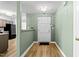Inviting entryway with tiled floors and views into the adjacent kitchen at 140 Heatherwood Dr, Apex, NC 27502