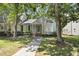 Inviting home featuring manicured landscaping, a bay window, and a charming entrance at 140 Heatherwood Dr, Apex, NC 27502