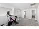 Bonus room featuring exercise equipment and multiple entryways at 147 Antler Steel Dr, Clayton, NC 27527